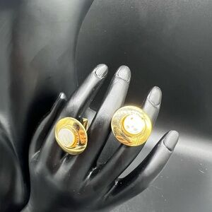 Gold tone cufflinks with pearlescent stone